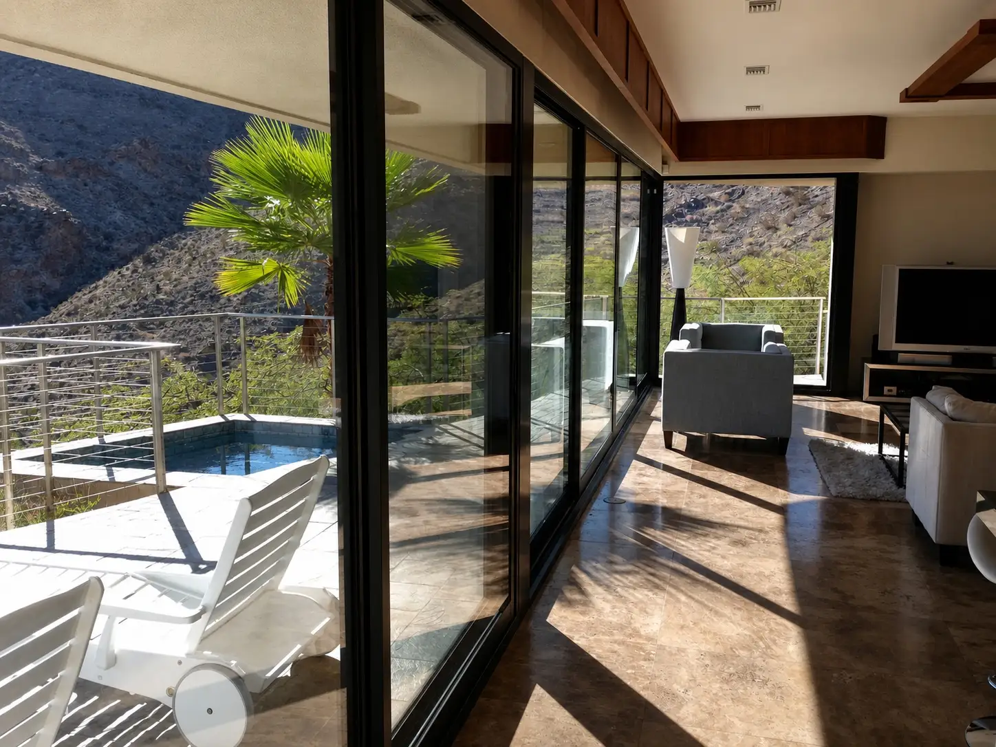 Tiger Tail — Poolside glass wall